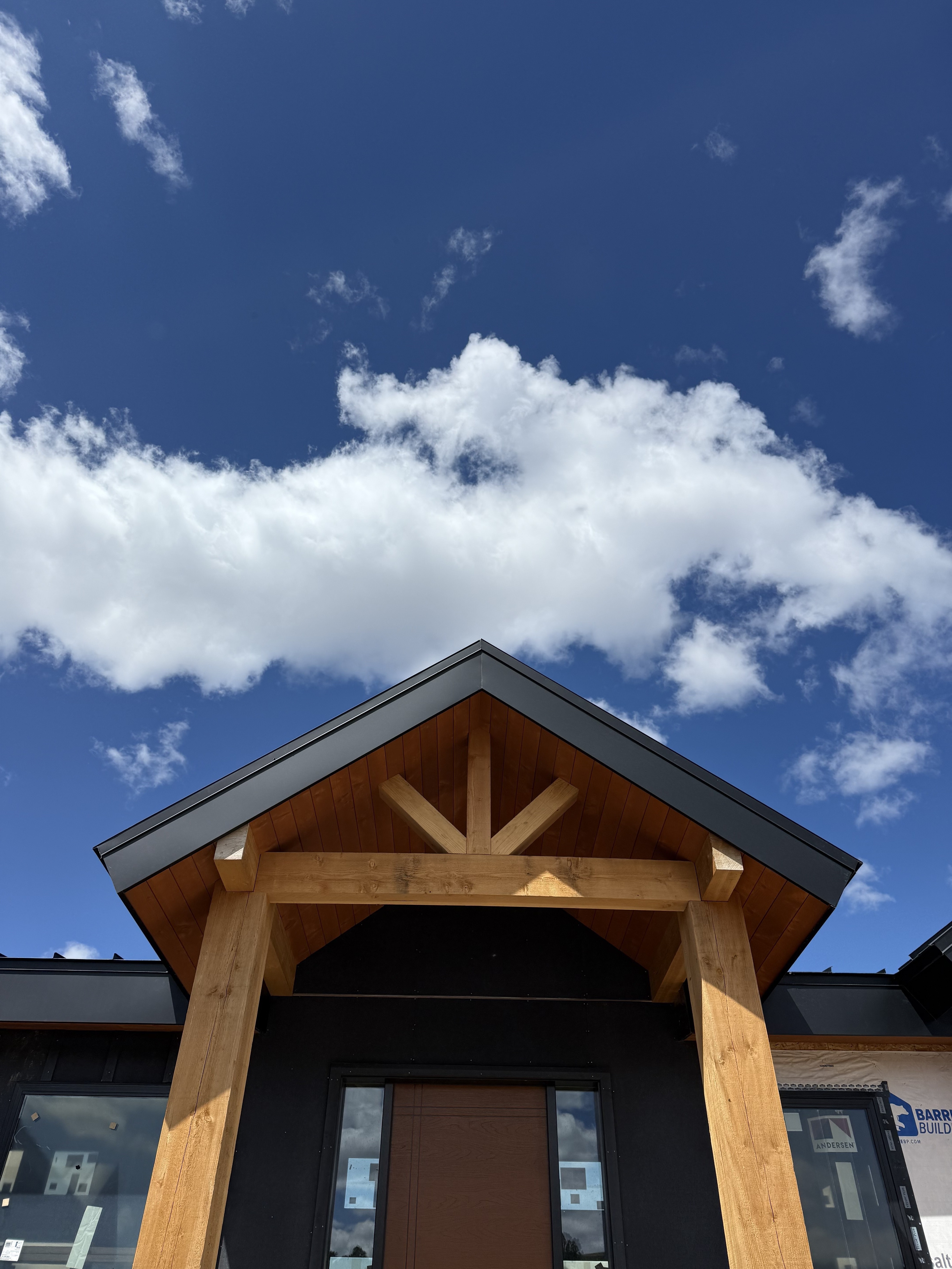 Custom timber and metal roof gable detail